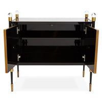 Black and gold cabinet with glass shelves on a white background
