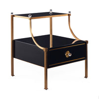 Black side table with gold accents on a white background