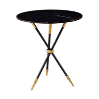 Round black marble table with gold accents on a white background