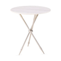 Round table with a white marble top and metallic base on a white background