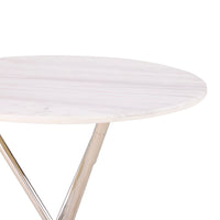 Round marble table with a white base on a white background