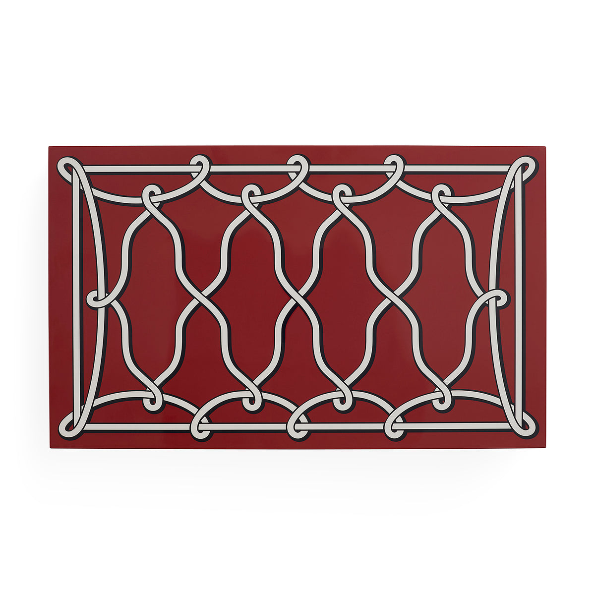 A rectangular decorative wall plaque featuring a white ornamental knotwork pattern on a deep red background, shown against a plain white studio backdrop.