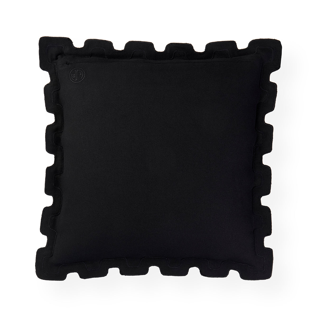 A square black throw pillow with a decorative scalloped or wavy piped border, shown from a top-down view on a solid white background.