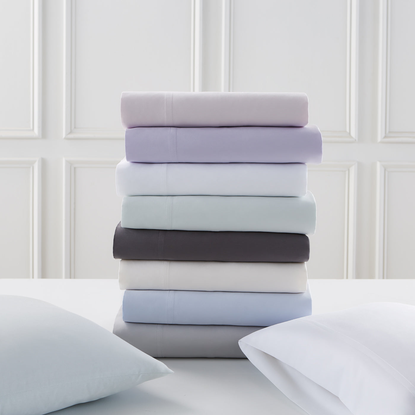 sateen sheet set stacked - styled view