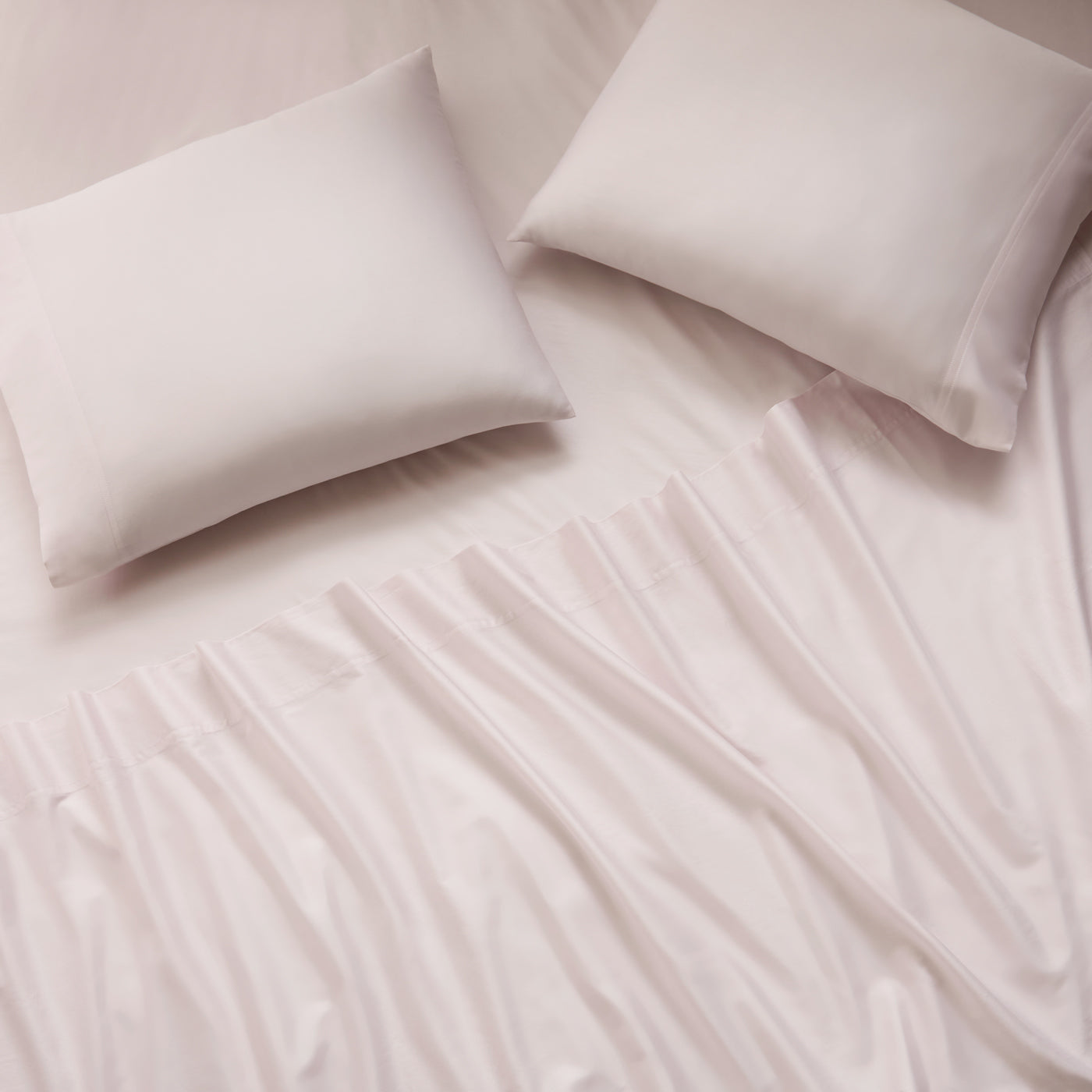 sateen sheet set blush - styled view