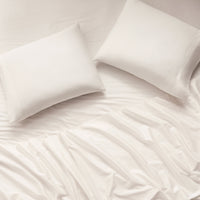 sateen sheet set ivory - styled view
