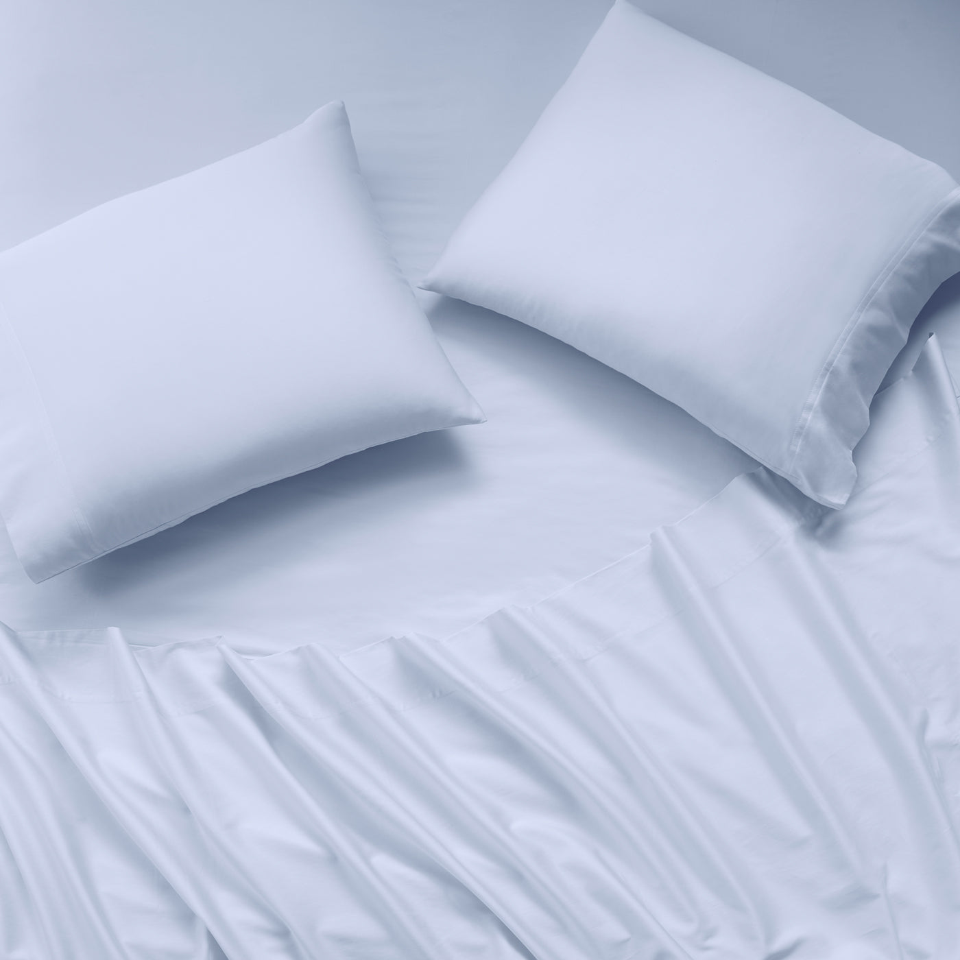 sateen sheet set light blue - styled view