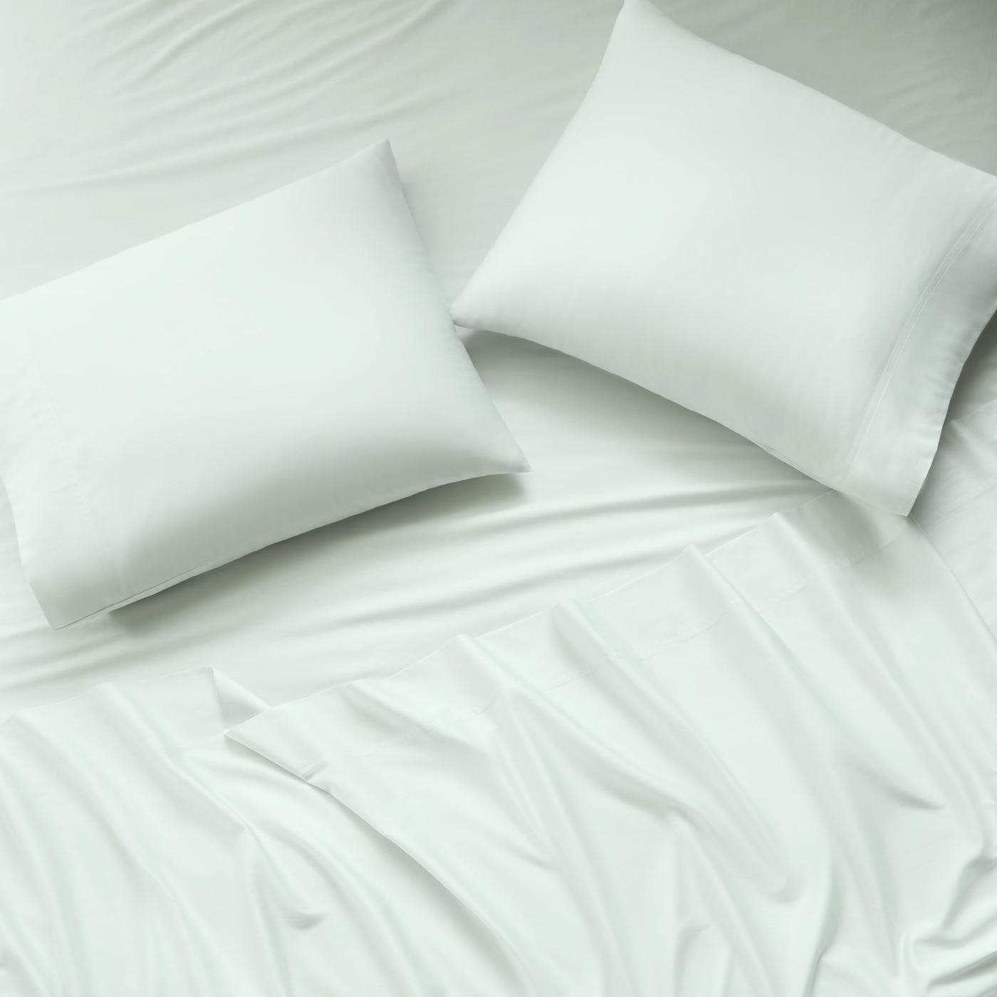 sateen sheet set light green - styled view