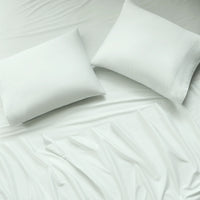 sateen sheet set light green - styled view