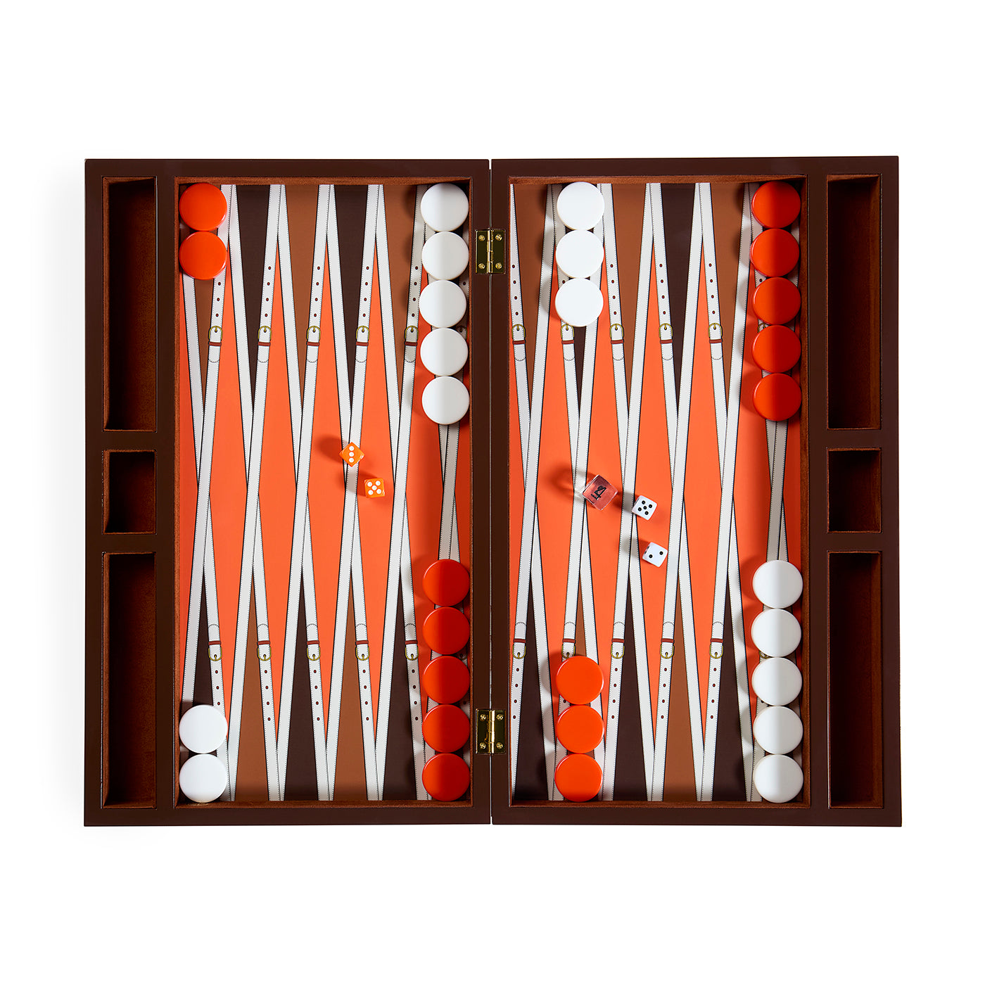 An open wooden backgammon board set with orange playing field, white and red checkers, and dice, photographed from above on a white background.