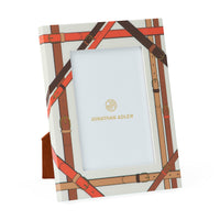 Jonathan Adler leather-strap patterned picture frame with a light blue insert, shown on a clean white background.