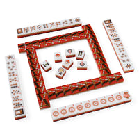 A set of Mahjong tiles arranged on a white background, with four rows of tiles forming a boundary and several loose tiles in the center.