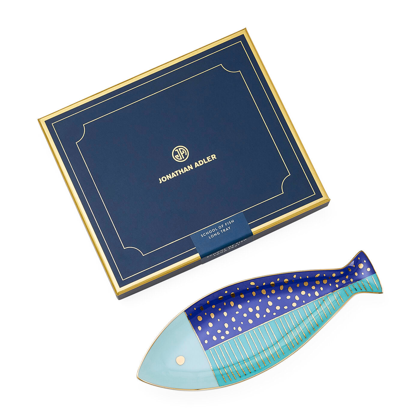 Decorative fish-shaped tray with Jonathan Adler packaging on a white background