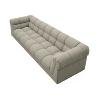 Gray tufted sofa on a white background