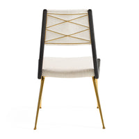 Chair with black frame, gold legs, and white seat on a white background