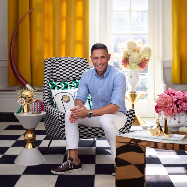 Jonathan Adler poses for a portrait with H&M HOME furniture in 2019