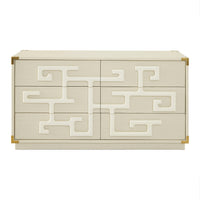 Beige dresser with geometric white patterns on a white background