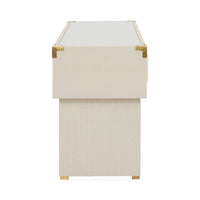 Beige side table with gold accents on a white background