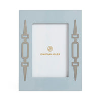 Jonathan Adler picture frame with decorative design on a light blue background