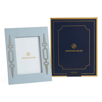 Two photo frames with Jonathan Adler logo on a white background