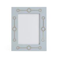 Decorative picture frame with geometric patterns on a white background