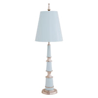 Decorative lamp with a white shade on a white background