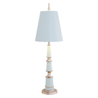Decorative lamp with a white shade on a white background