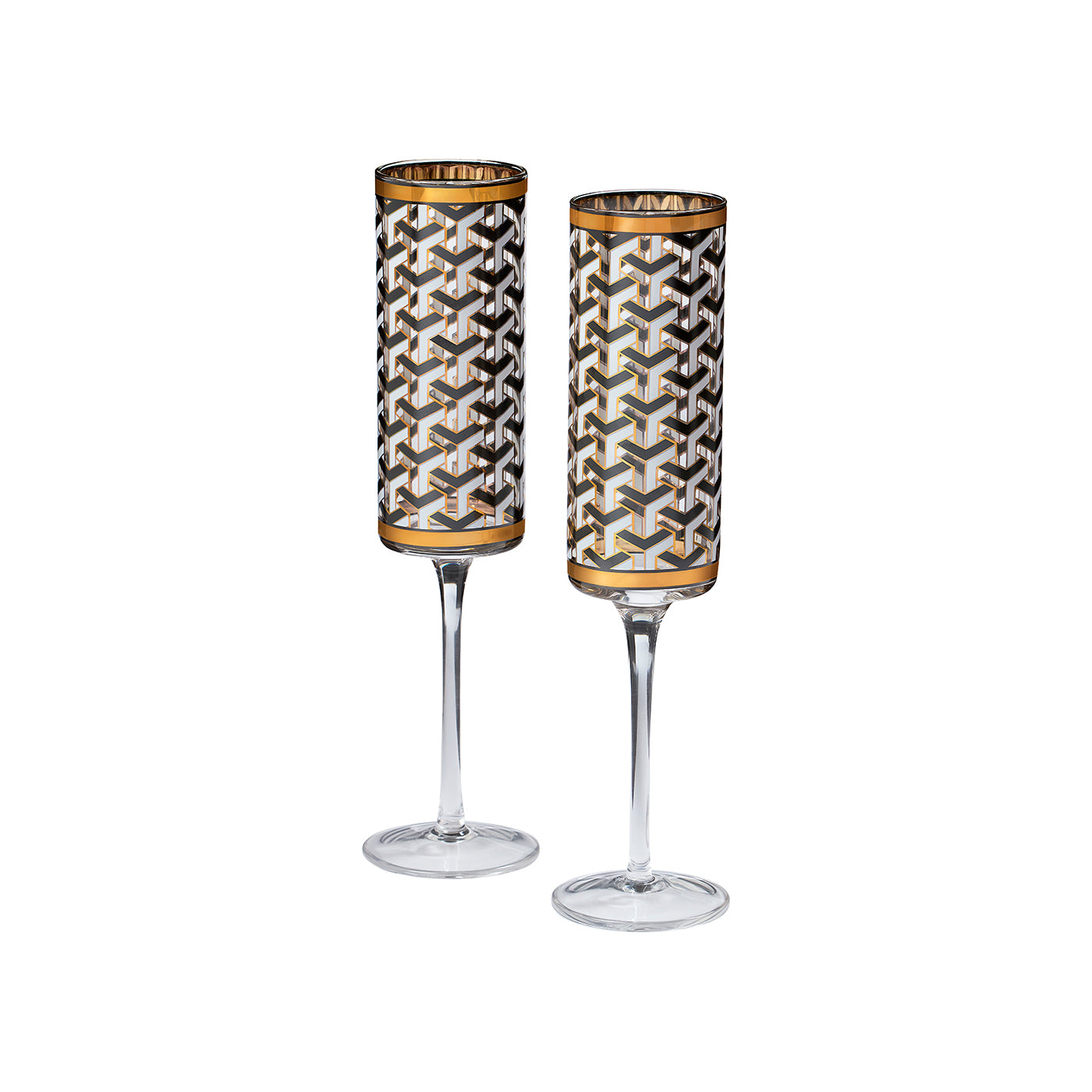 Two clear stemmed glasses with cylindrical bowls featuring a geometric interlocking cube pattern in black, white, and gold, set against a plain white background.