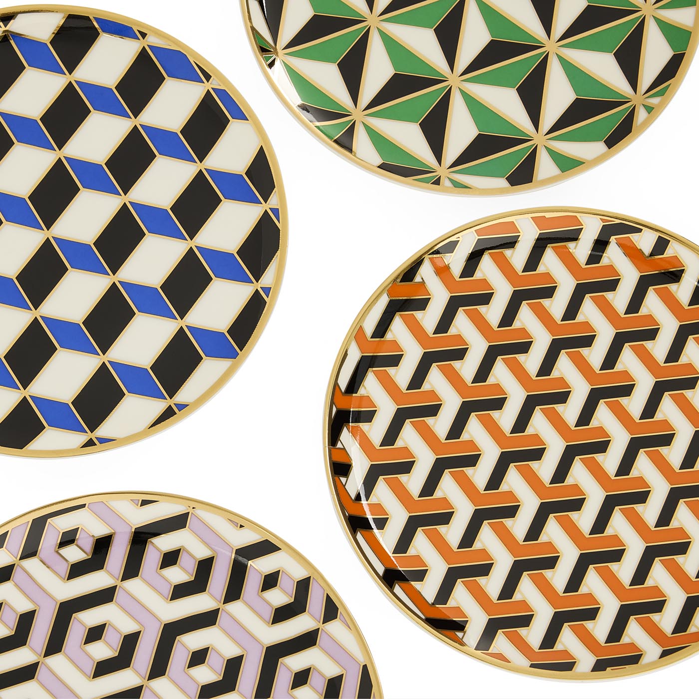 Set of geometric patterned plates on a white background
