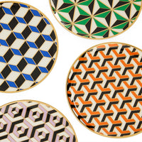 Set of geometric patterned plates on a white background