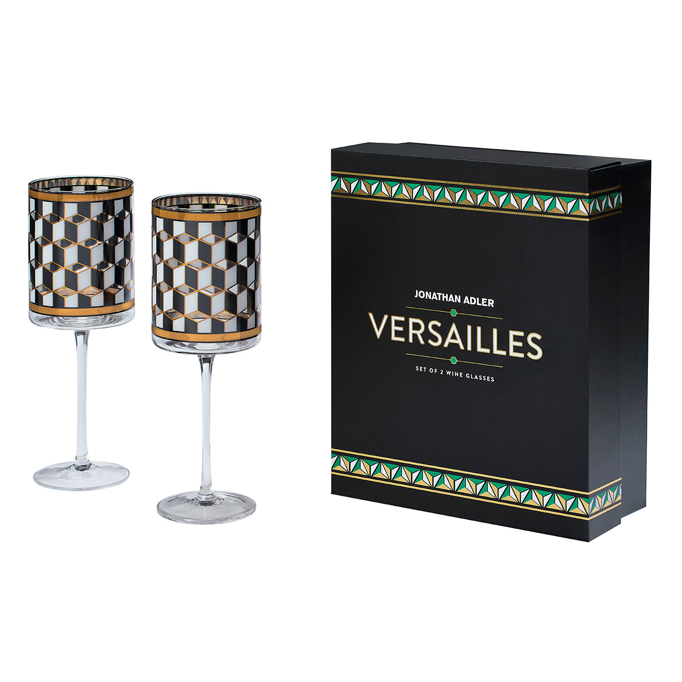 Two Jonathan Adler Versailles wine glasses with a black, white, and gold geometric pattern, shown next to their black presentation box.
