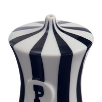A close-up of a glossy ceramic bottle or vase with a white body, dark navy blue vertical stripes, and a large embossed letter 'P' on the front, set against a plain white background.