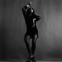 "tina"turner, hand above head" from getty images - front view