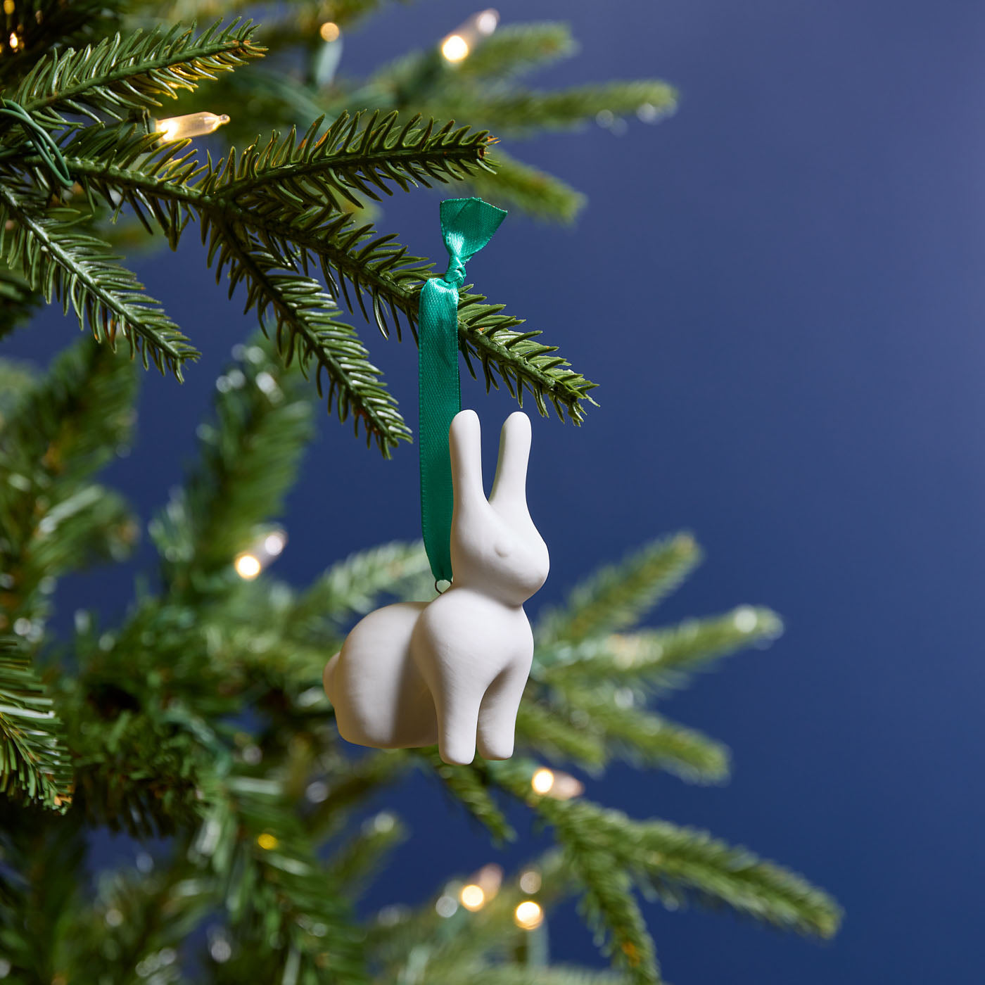 rabbit ornament on tree - styled view 1
