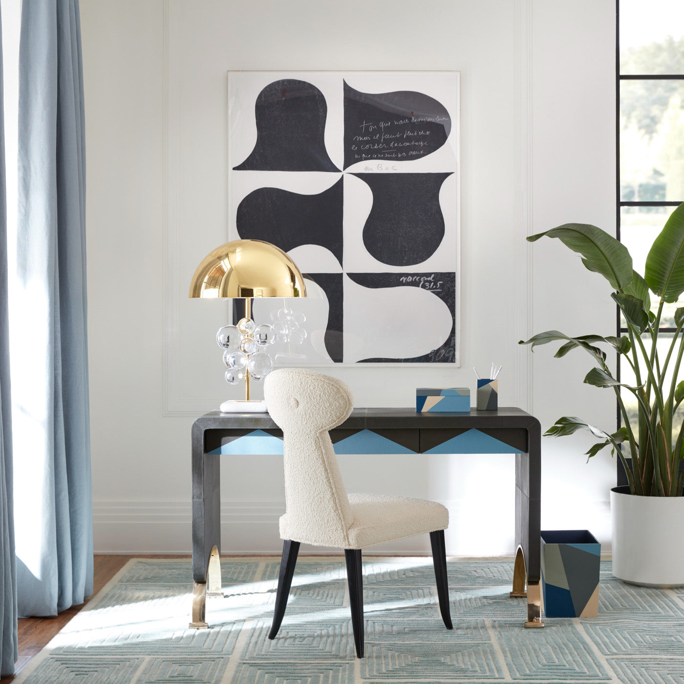 arcade console desk vera dining chair globo table lamp - styled view